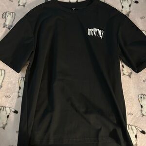 Baggy graphic tee with design on the back